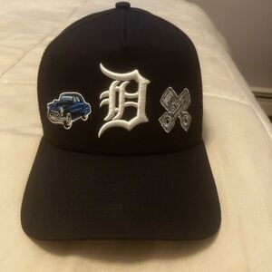 New Era Black Hat with Blue and White Accents